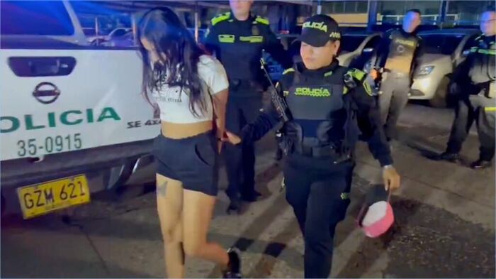 Image: A 23-year-old Colombian female killer known as 'The Doll' is caught 3th image